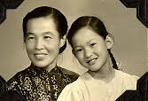 Sepia toned image of Alice Huang in her childhood with an adult