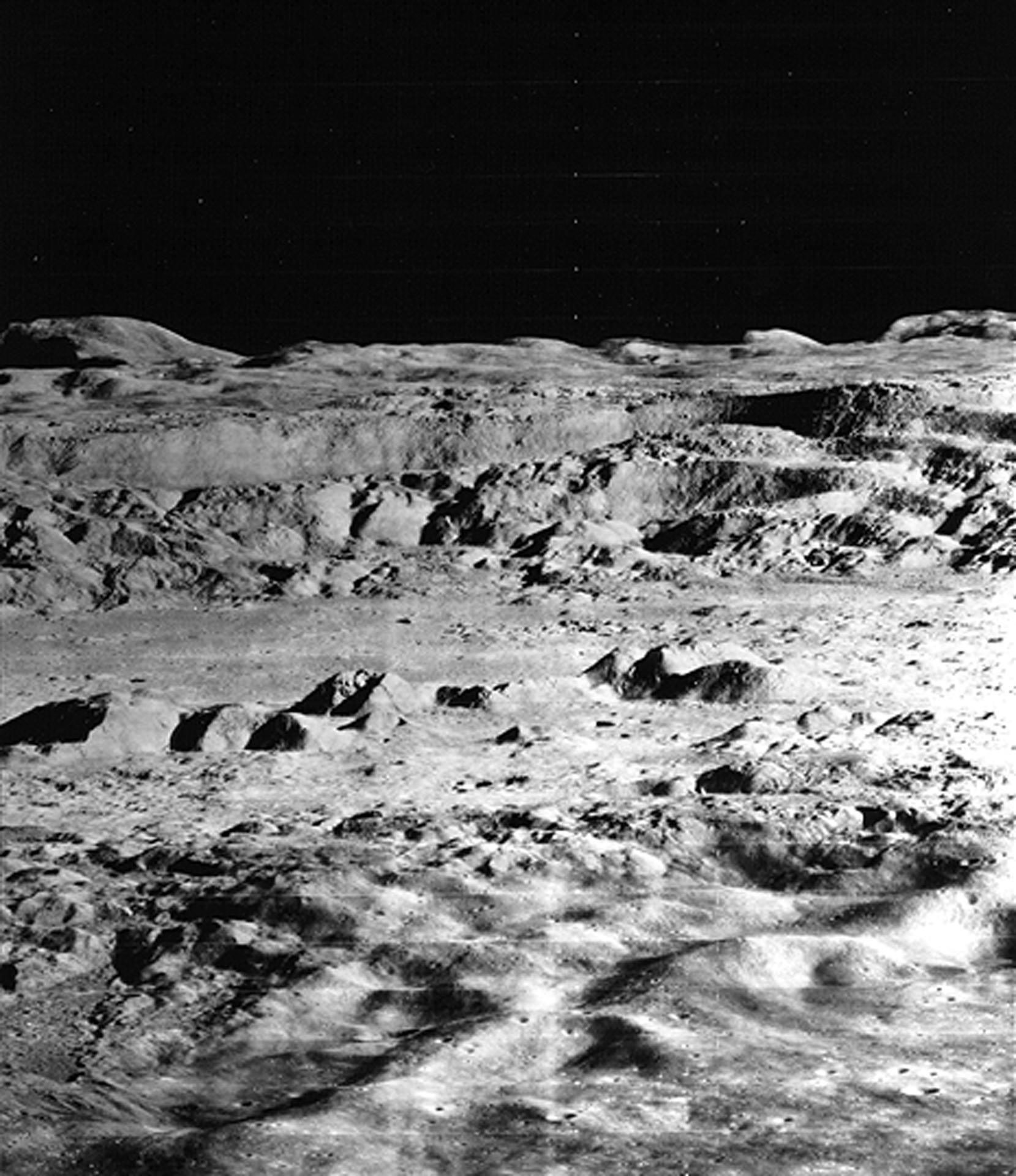 A black-and-white lunar landscape.