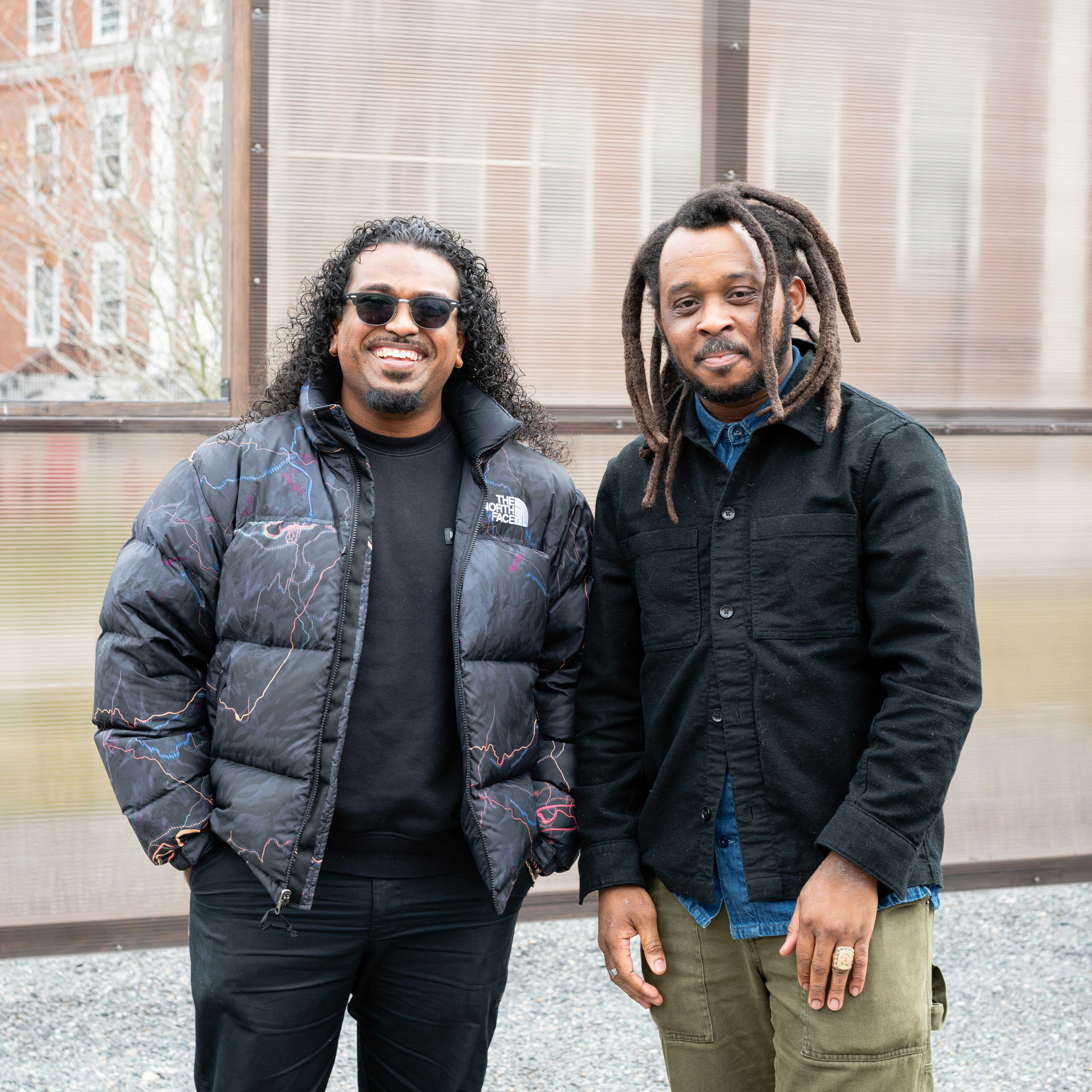 Photo of the 2023 RIPAC Winners (left to right) Gabriel Jean-Paul Soomar and Curry J. Hackett in front of their art installation in the Wallach Garden.