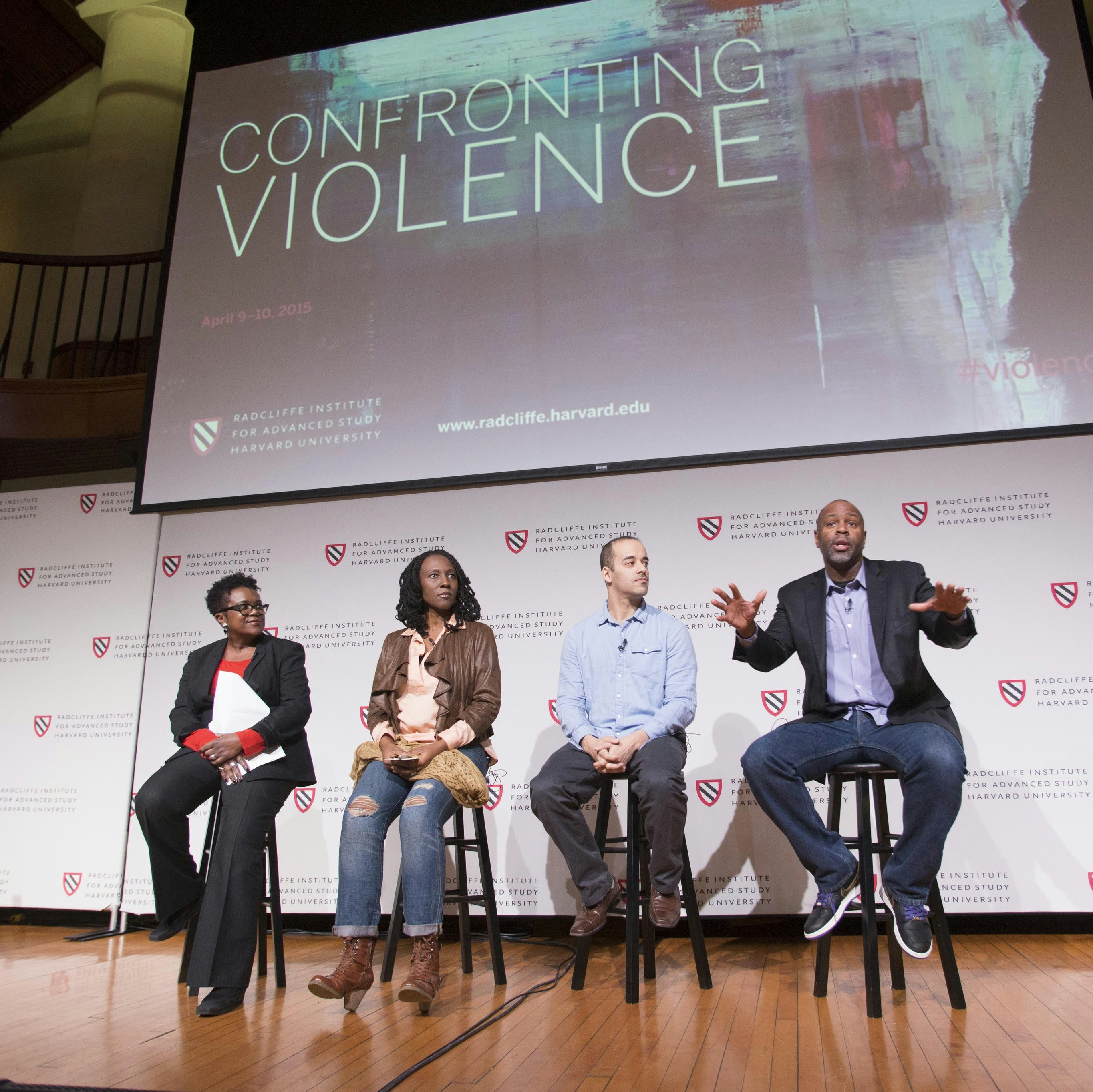 Panel having a discussion at "Confronting Violence"