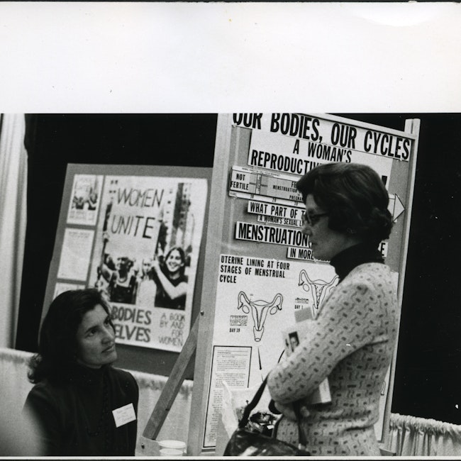 Norma Swenson and Betsy Cole at exhibit booth for Our Bodies, Ourselves