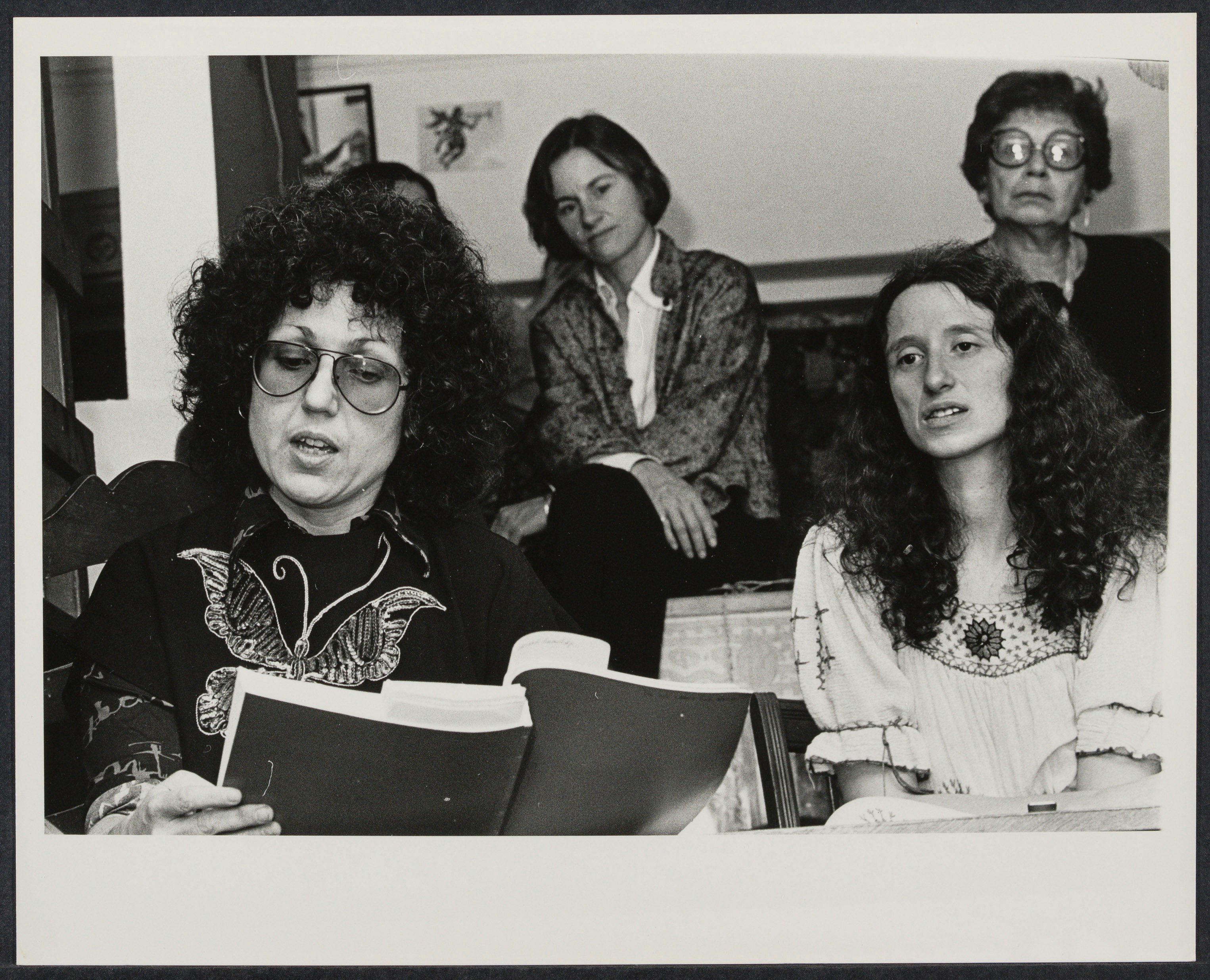 Judy Chicago reading "Revelations of the Goddess: A Chronical of the Dinner Party" at the Woman's Salon