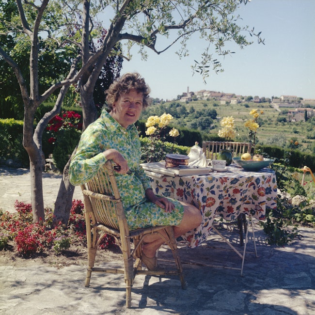 Julia Child having breakfast in the terrace
