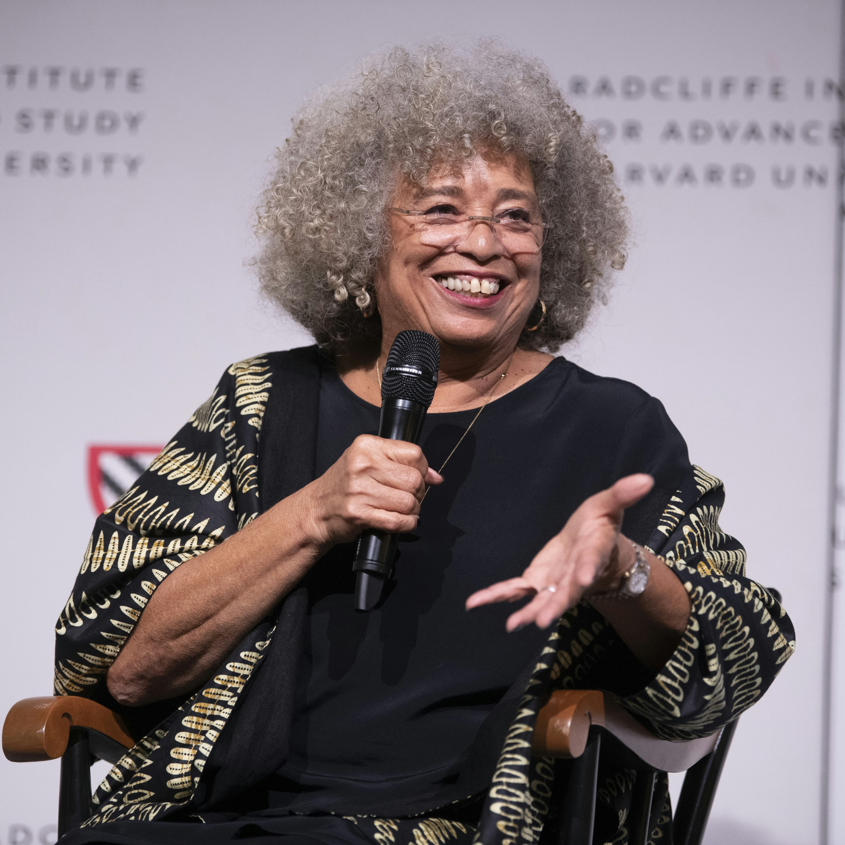 Angela Y. Davis seated and speaking into microphone