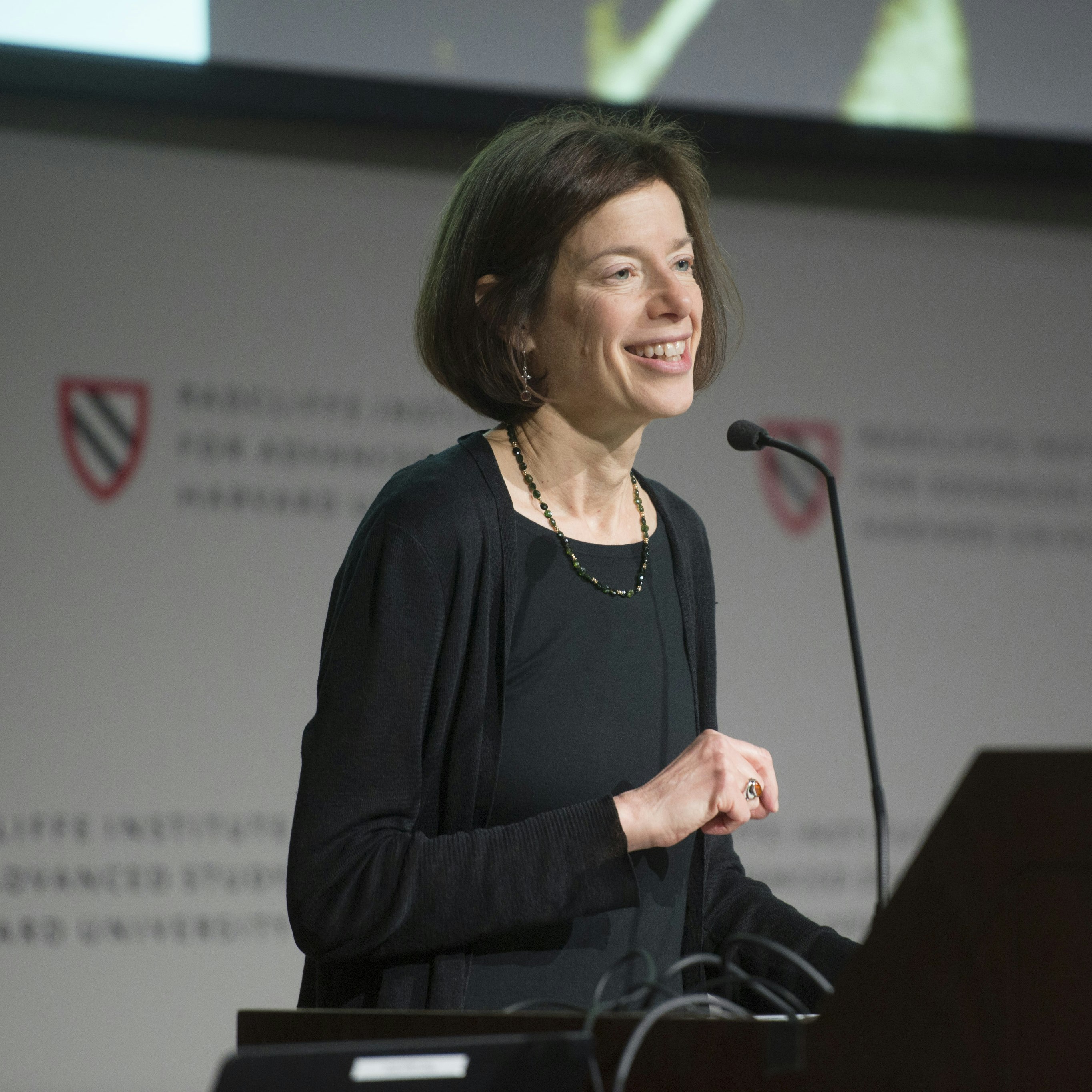 Susan Faludi speaking at Radcliffe's "Hidden in Plain Sight" panel discussion.