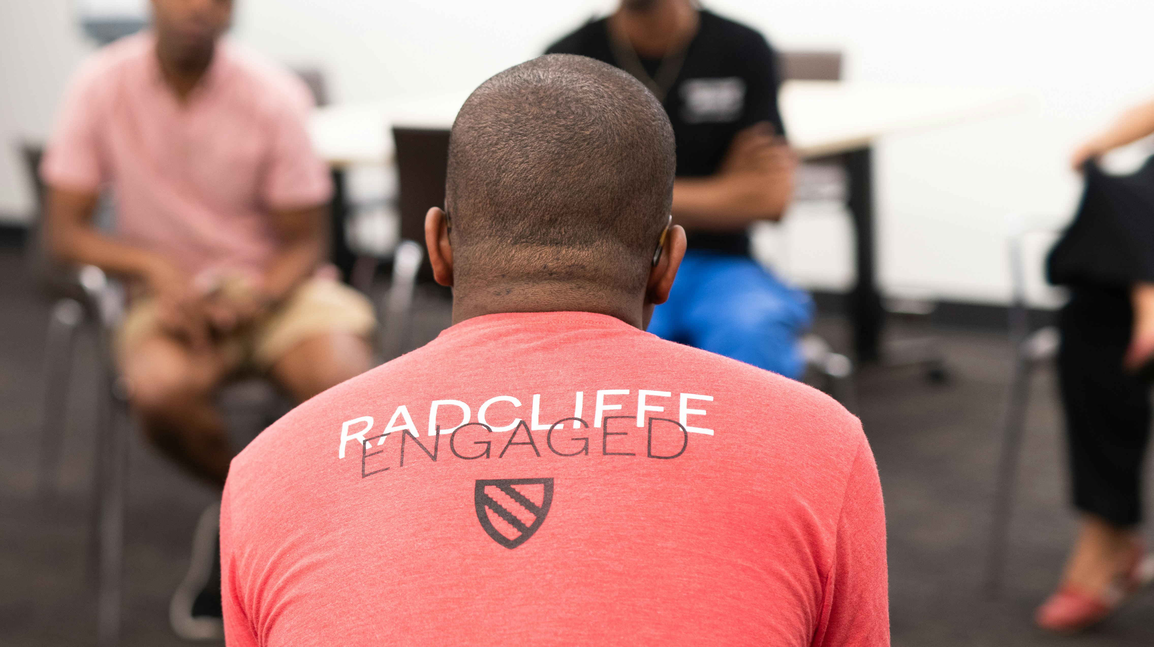 Student wearing a "Radcliffe Engaged" t-shirt