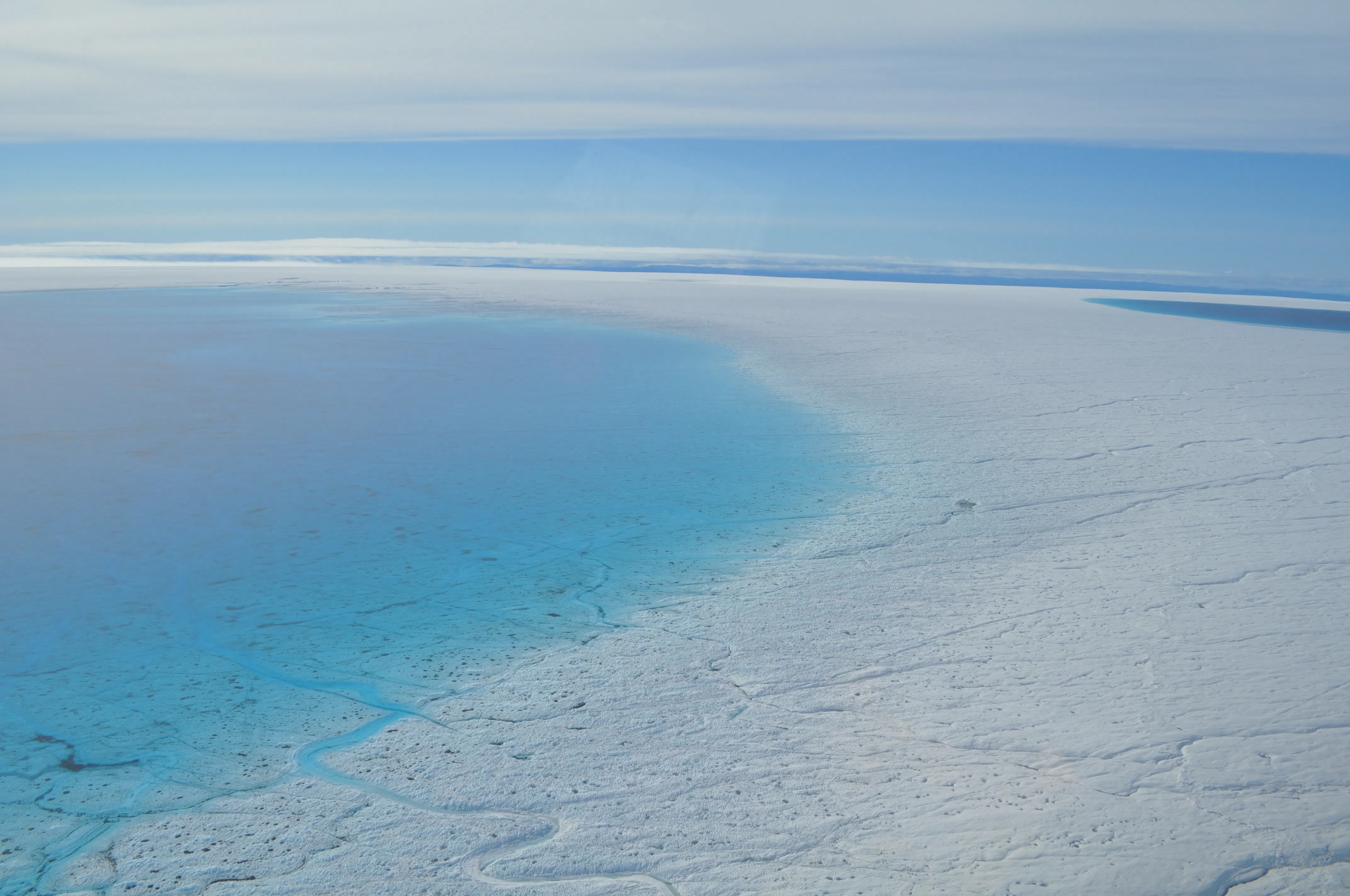 Supraglacial lakes and streams forming on the surface of the Greenland Ice Sheet