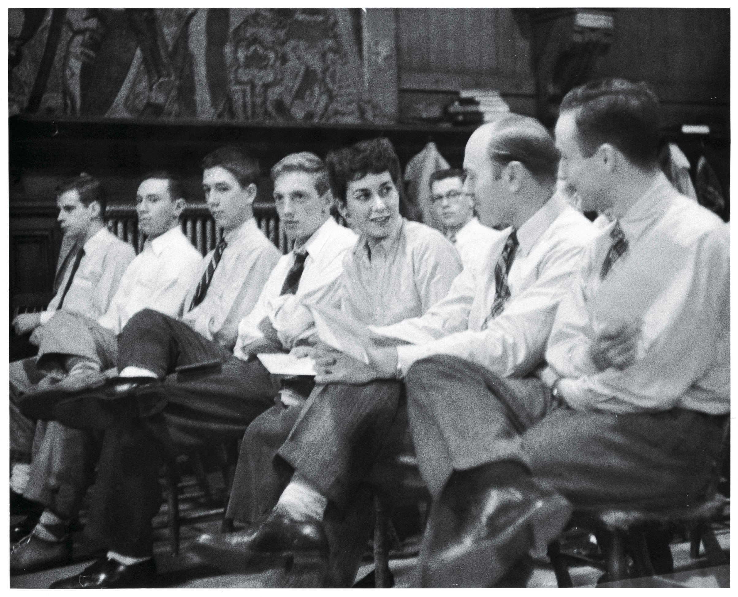In the 1950s, Radcliffe College shared only course instruction with Harvard. Nancy Fisher '54 sits in on a lecture with Harvard men. Courtesy Radcliffe Archives, Schlesinger Library