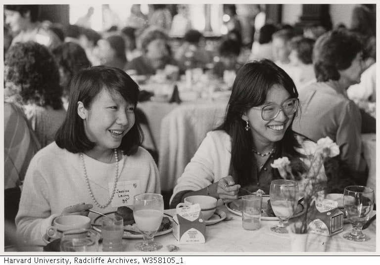 Black & White image of two Asian students at luncheon