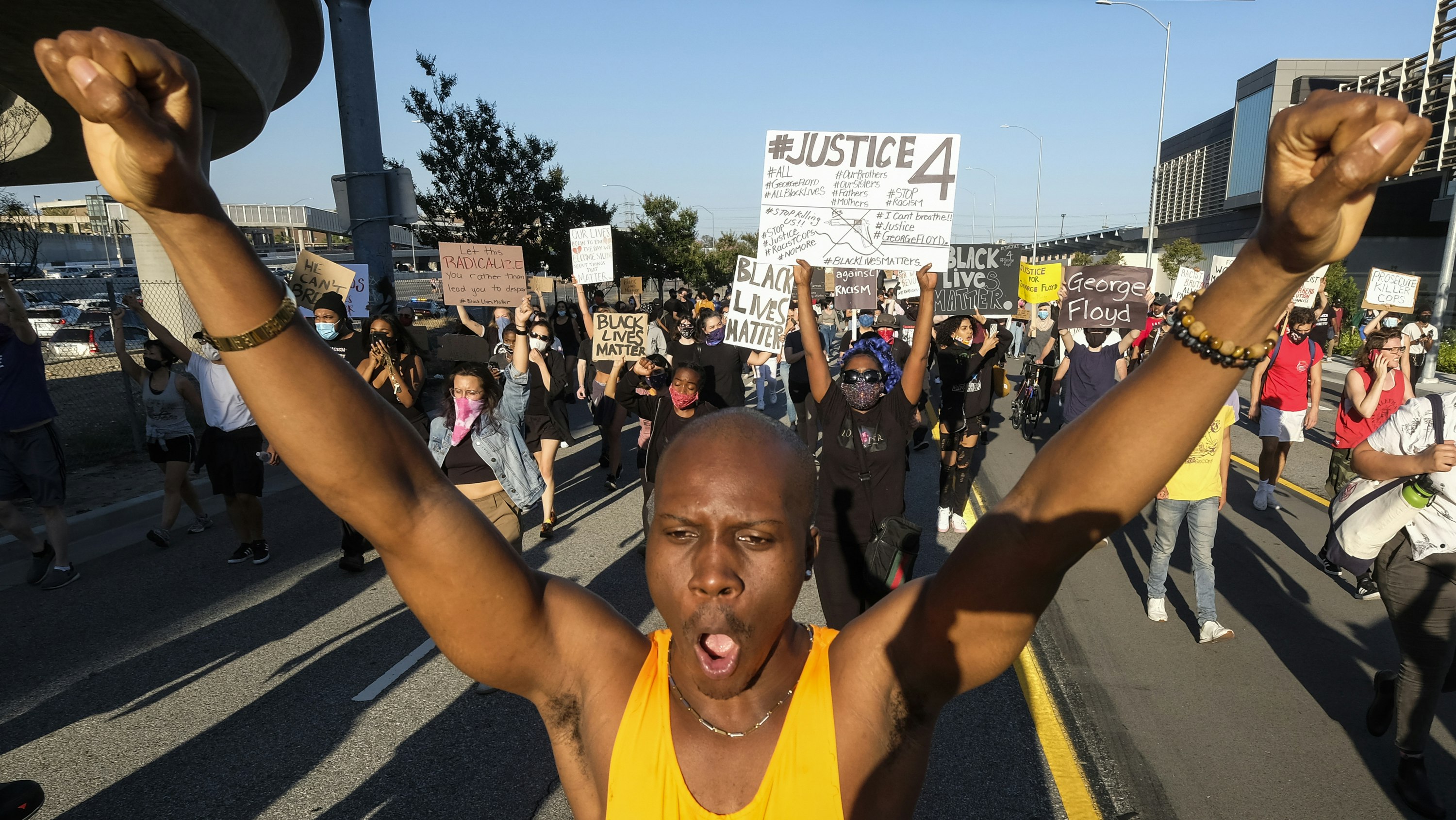 Demonstrators marched in Los Angeles following the police killing of George Floyd in Minneapolis. AP Photo/Ringo H.W. Chiu