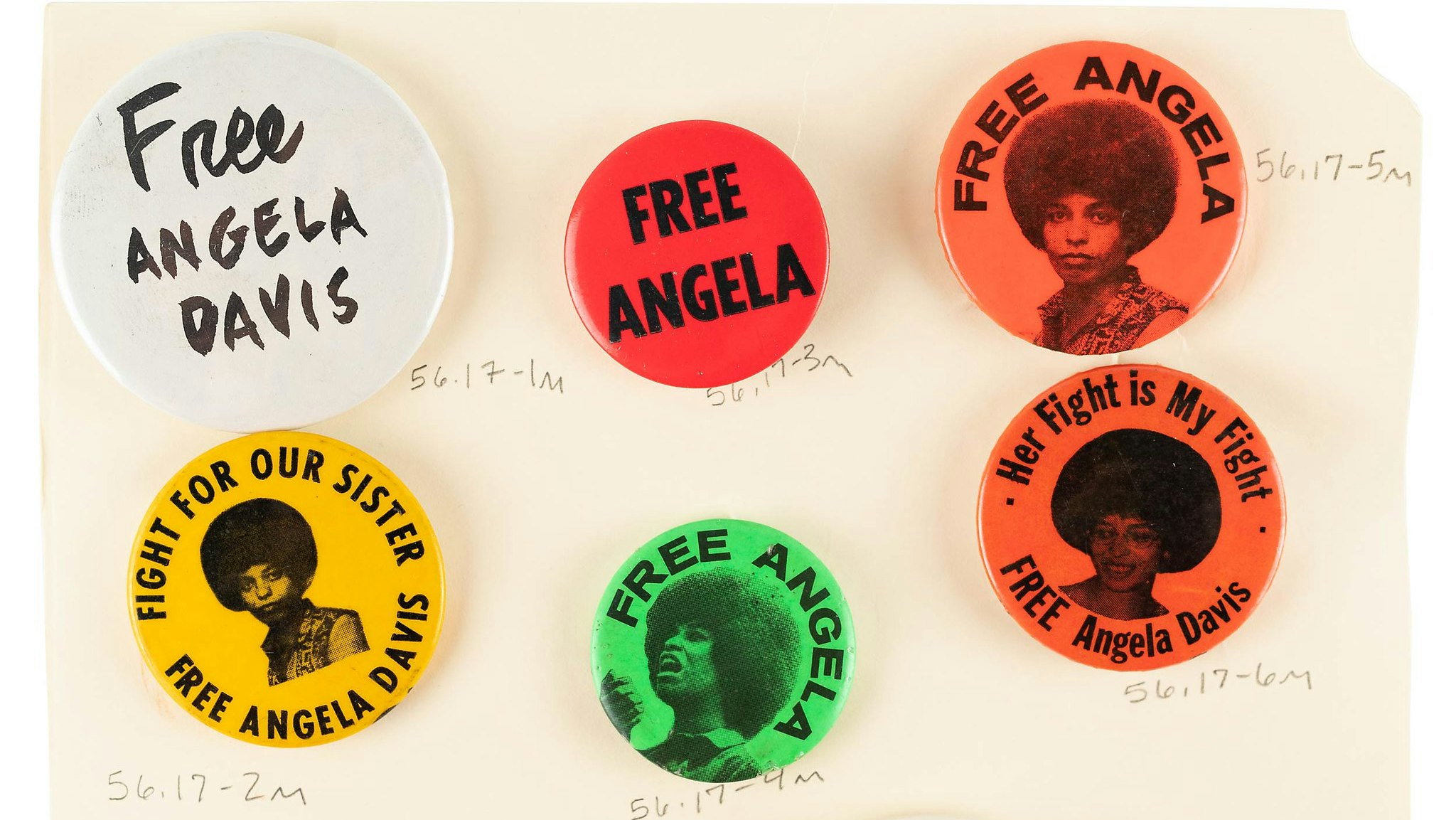 "Free Angela" and "Free Angela Davis" buttons.