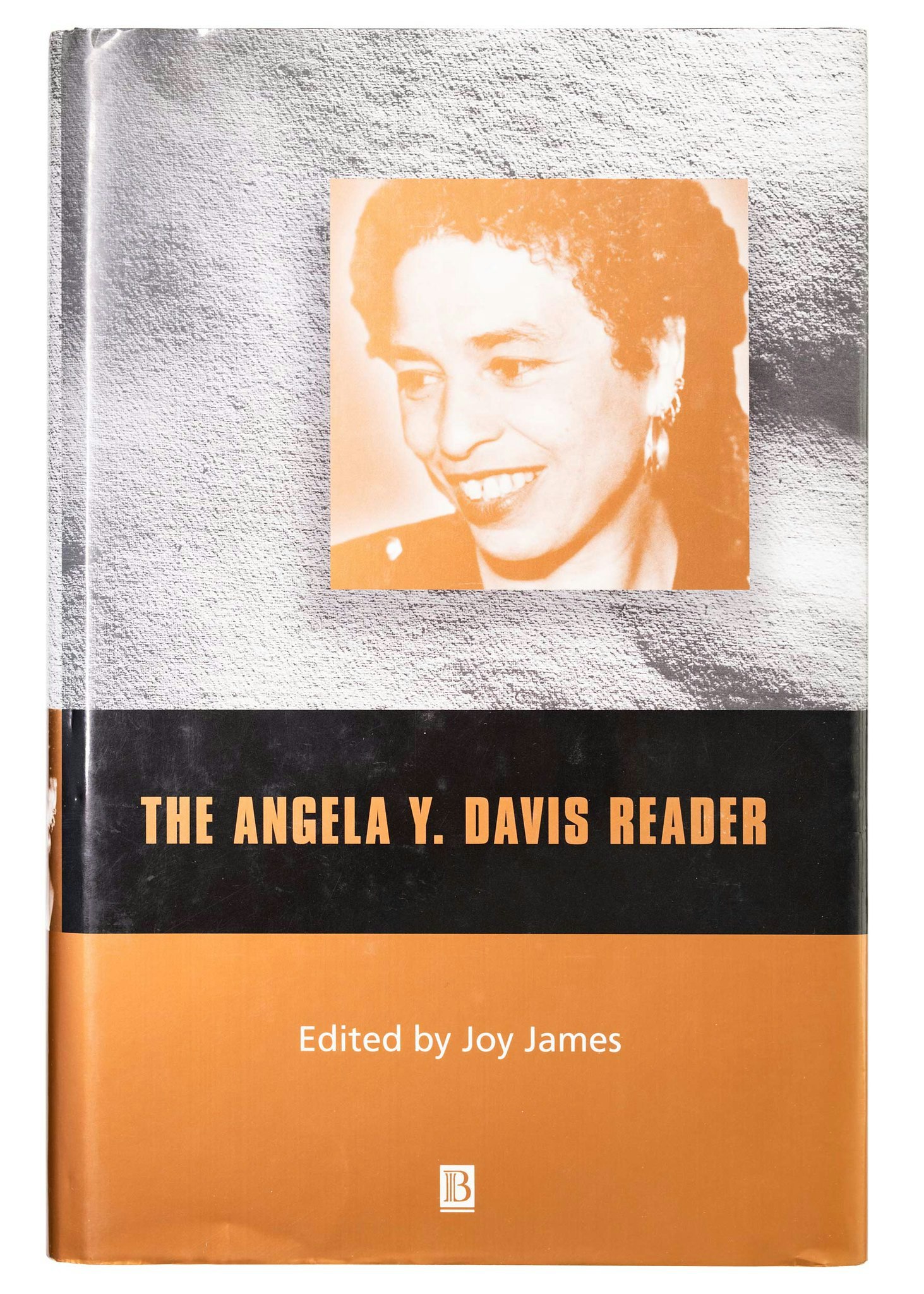 Angela Y. Davis Book cover with headshot of Davis tinted orange