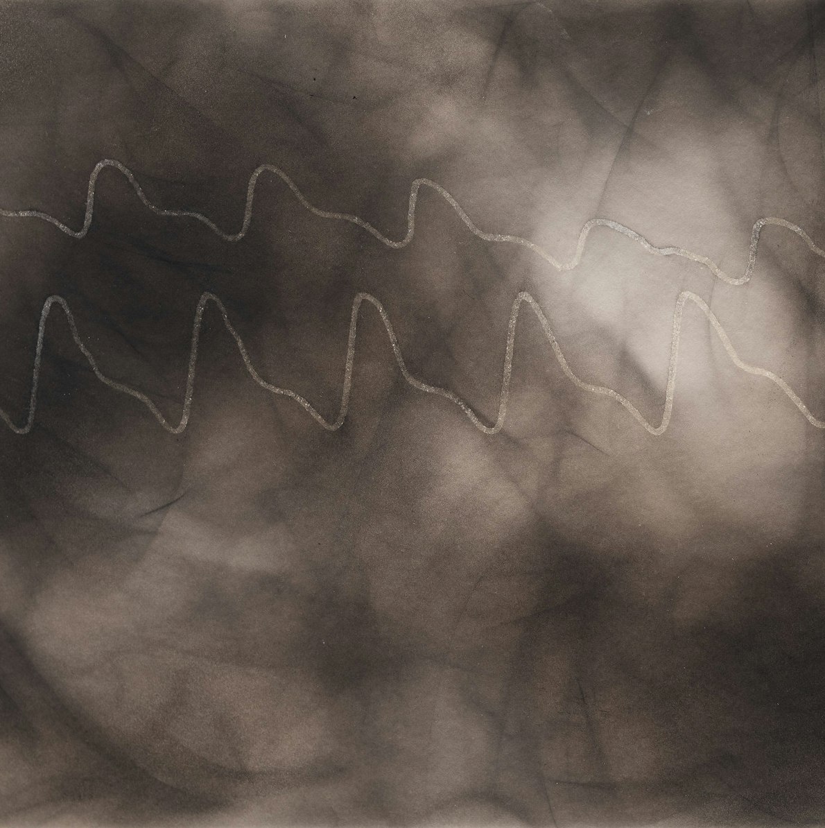 Black, white and sepia toned, watercolor image with a design that looks like 2 electrocardiograms, one right below the other.