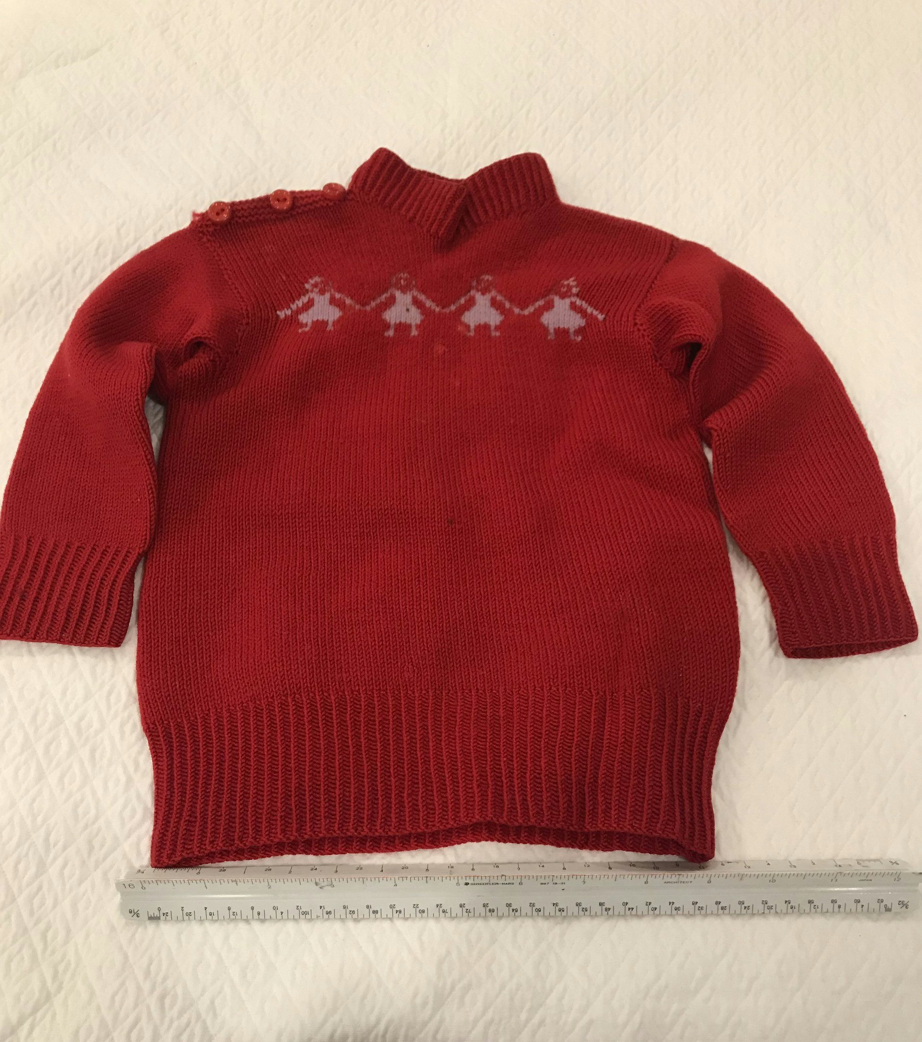 Toddler sized red knit sweater with 4 girls holding hands