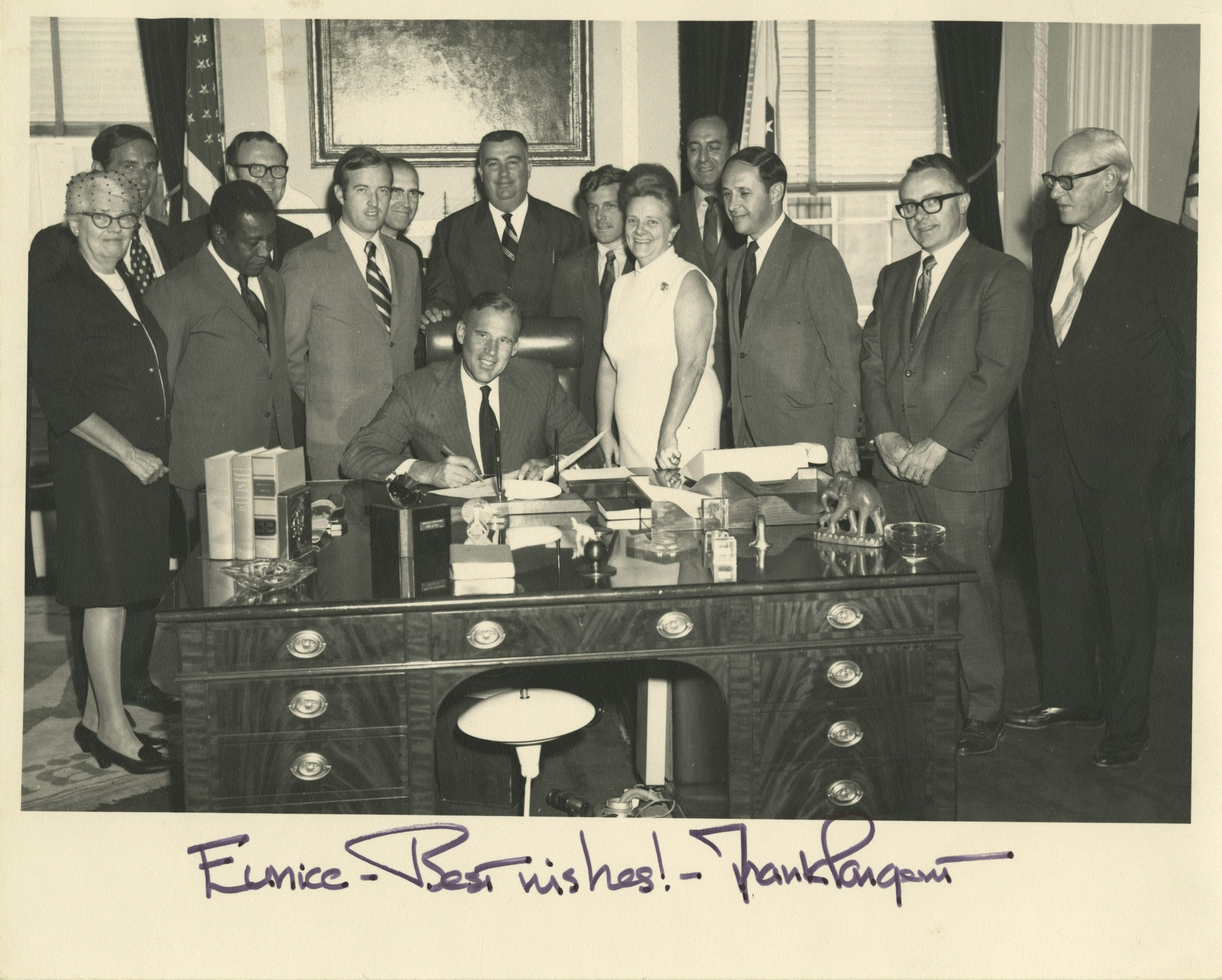 Eunice Howe with Governor Frank Sargent and a group of others in the Governor's office