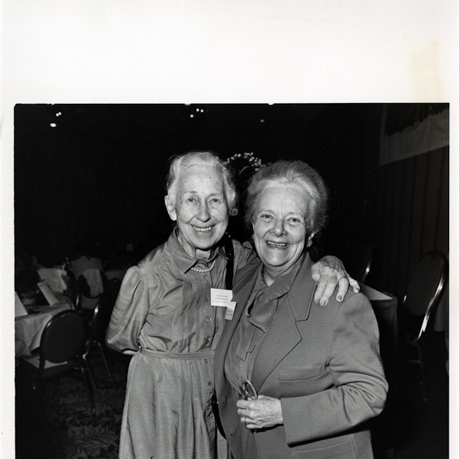 Eunice Howe smiling with Esther Peterson