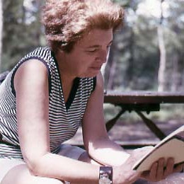 Gerda Lerner reading a book in the Grand Canyon, circa 1979