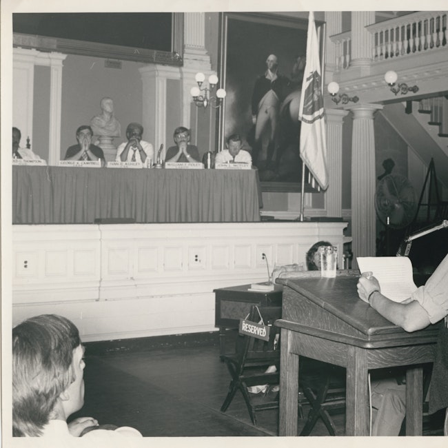 Kip Tierman giving a testimony in the Great Hall at Faneuil Hall, ca. 1975.