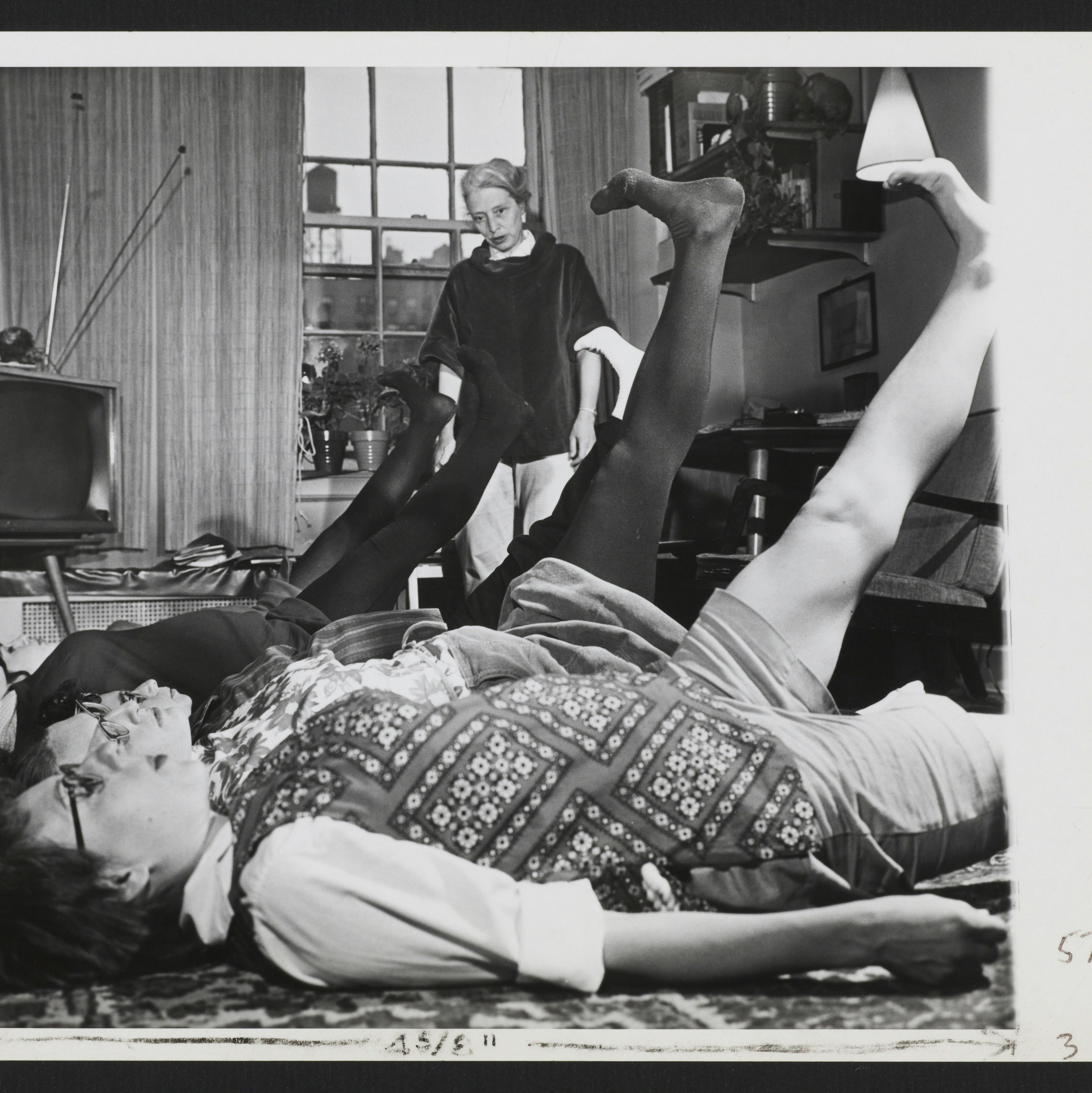 Elisabeth Bing and her students during a Lamaze class, performing an exercise