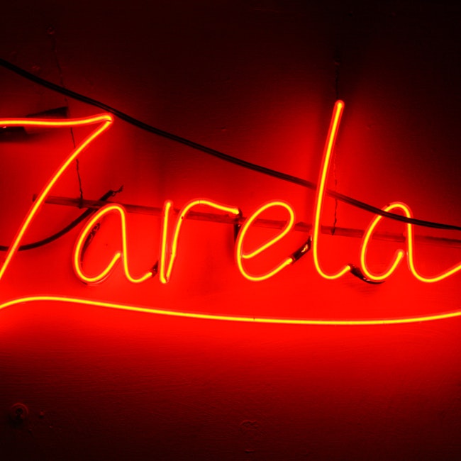 Neon sign in red, "Zarela"