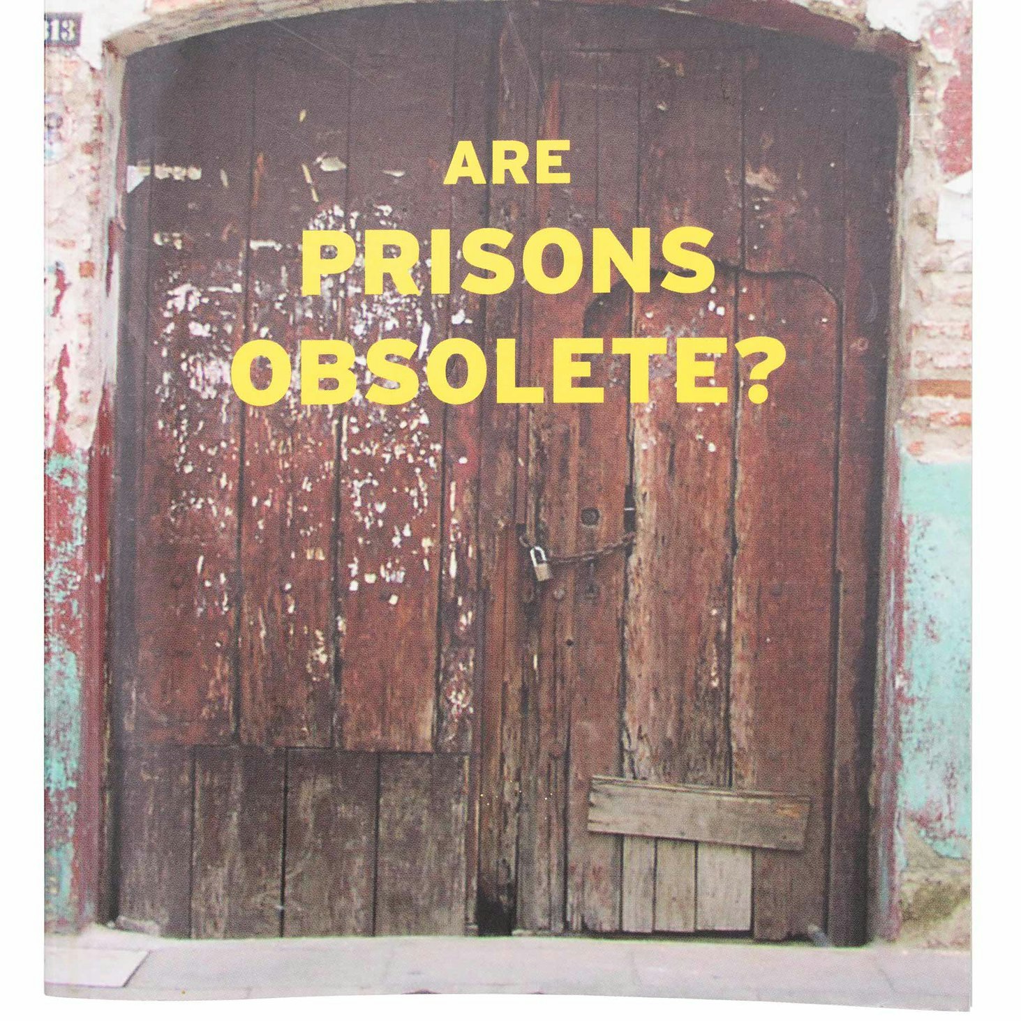 Book cover with two large wood doors. Text reads "Are Prisons Obsolete?" in yellow font.