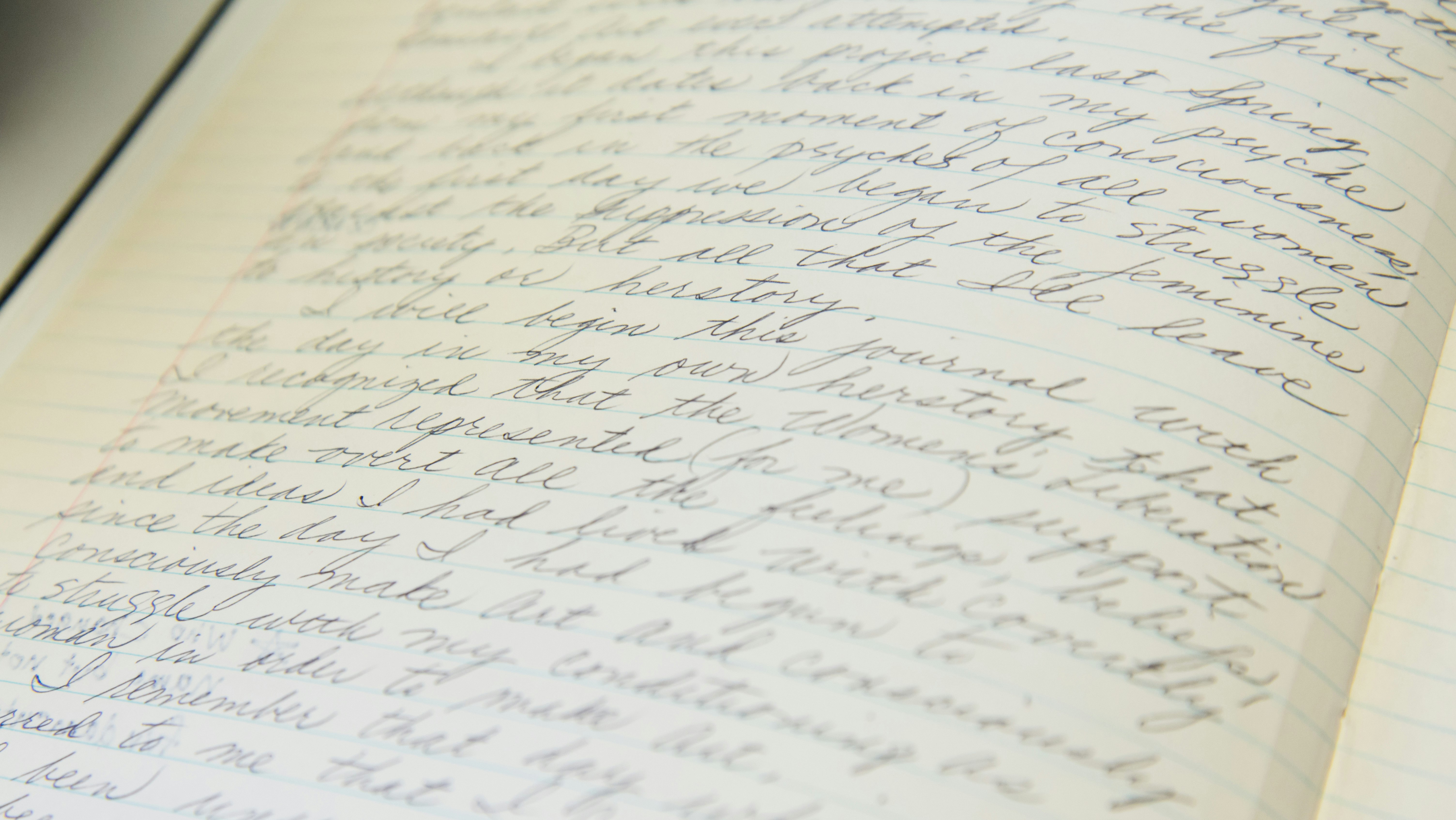 Close-up of writing in a notebook
