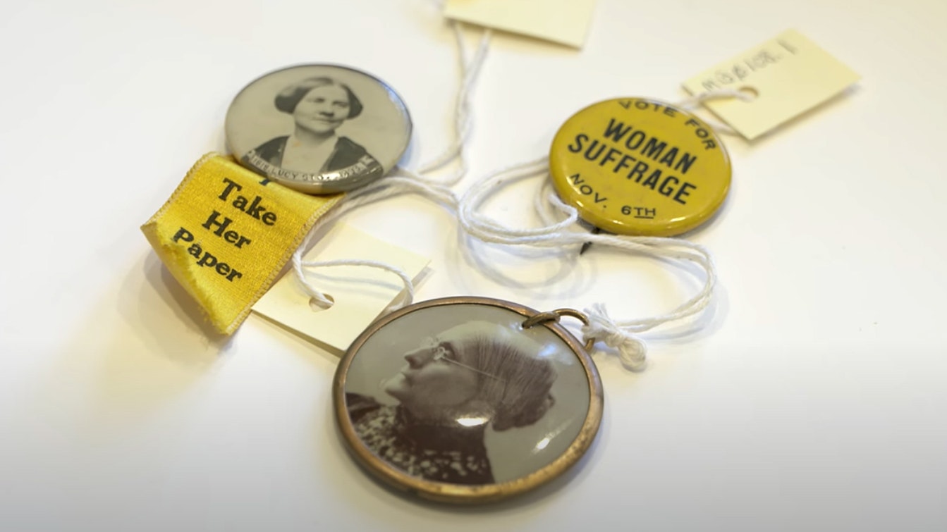 Photograph of women suffrage buttons